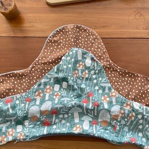 2 Yeah baby goods cushion covers mushroom meadow and cream beans on orange rust